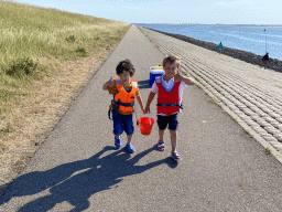 Max and his friend with a bucket with crabs at the beach near the Dijkweg road