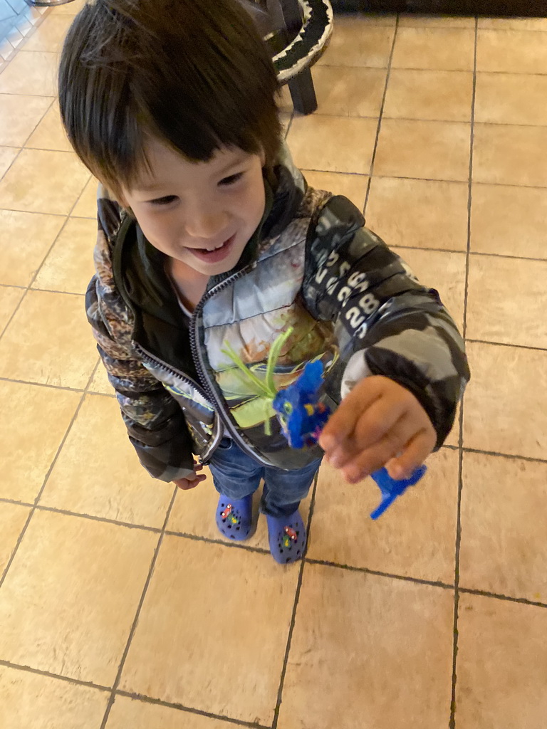 Max with a toy at the restaurant of the Oosterschelde Camping Stavenisse