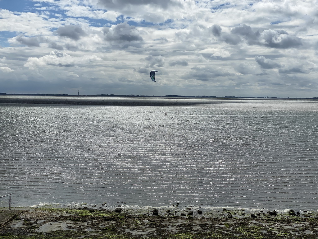 Kitesurfer at the National Park Oosterschelde, viewed from the beach near the Dijkweg road