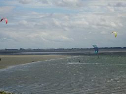 Kitesurfers at the National Park Oosterschelde, viewed from the beach near the Dijkweg road