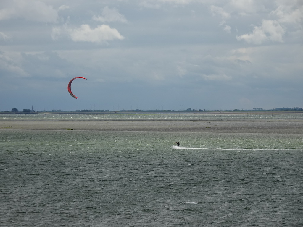 Kitesurfer at the National Park Oosterschelde, viewed from the beach near the Dijkweg road