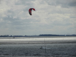 Kitesurfer at the National Park Oosterschelde, viewed from the beach near the Dijkweg road