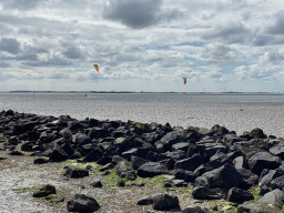 Kitesurfers at the National Park Oosterschelde, viewed from the beach near the Dijkweg road