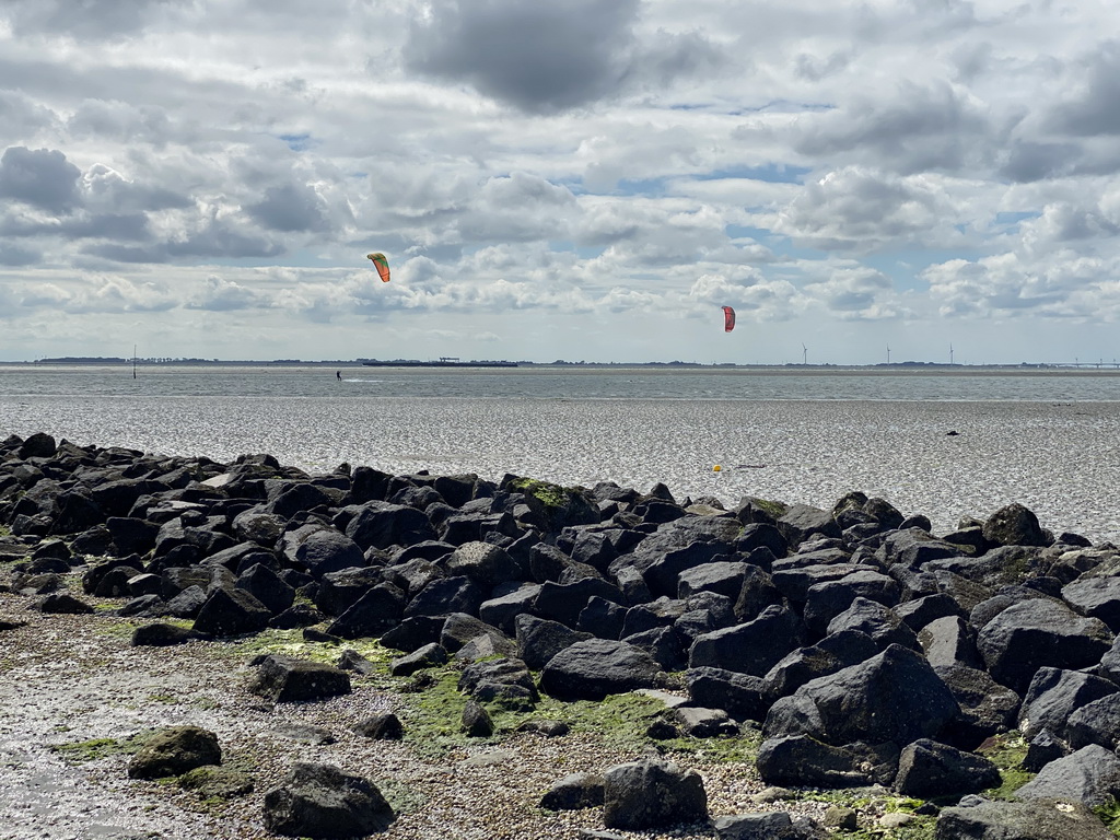 Kitesurfers at the National Park Oosterschelde, viewed from the beach near the Dijkweg road