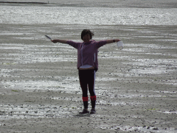 Miaomiao looking for seashells at the beach near the Dijkweg road