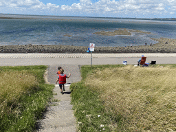 Max and his friend at the staircase to the beach near the Dijkweg road