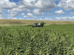 Tractor in a field at the Pilootweg road