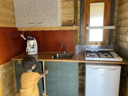 Max at the kitchen of the Stuurhut holiday home at the Oosterschelde Camping Stavenisse