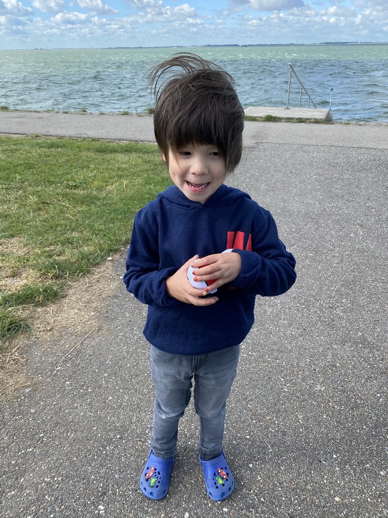 Max with a Pokémon ball at the beach near the Dijkweg road