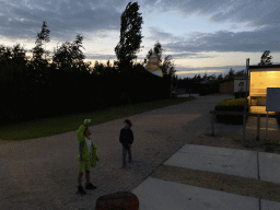 Max and his friend playing with a kite at the Oosterschelde Camping Stavenisse, at sunset