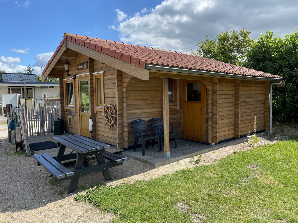 Right front of the Stuurhut holiday home at the Oosterschelde Camping Stavenisse