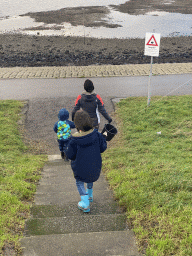 Max flying a kite and our friends at the staircase to the beach near the Dijkweg road