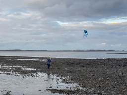 Our friend flying a kite at the beach near the Dijkweg road