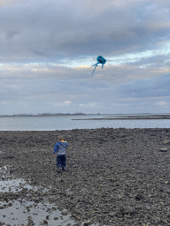 Our friend flying a kite at the beach near the Dijkweg road