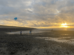 Miaomiao and our friends flying a kite and catching seashells at the beach near the Dijkweg road