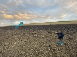 Max flying a kite at the beach near the Dijkweg road