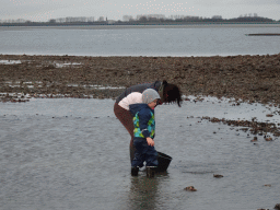 Our friends catching seashells at the beach near the Dijkweg road