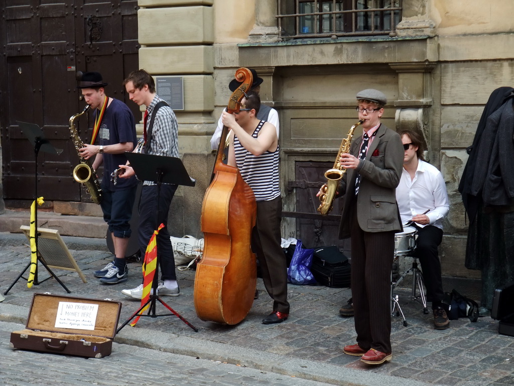 Street musicians at the Järntorget square in the Gamla Stan neighborhood