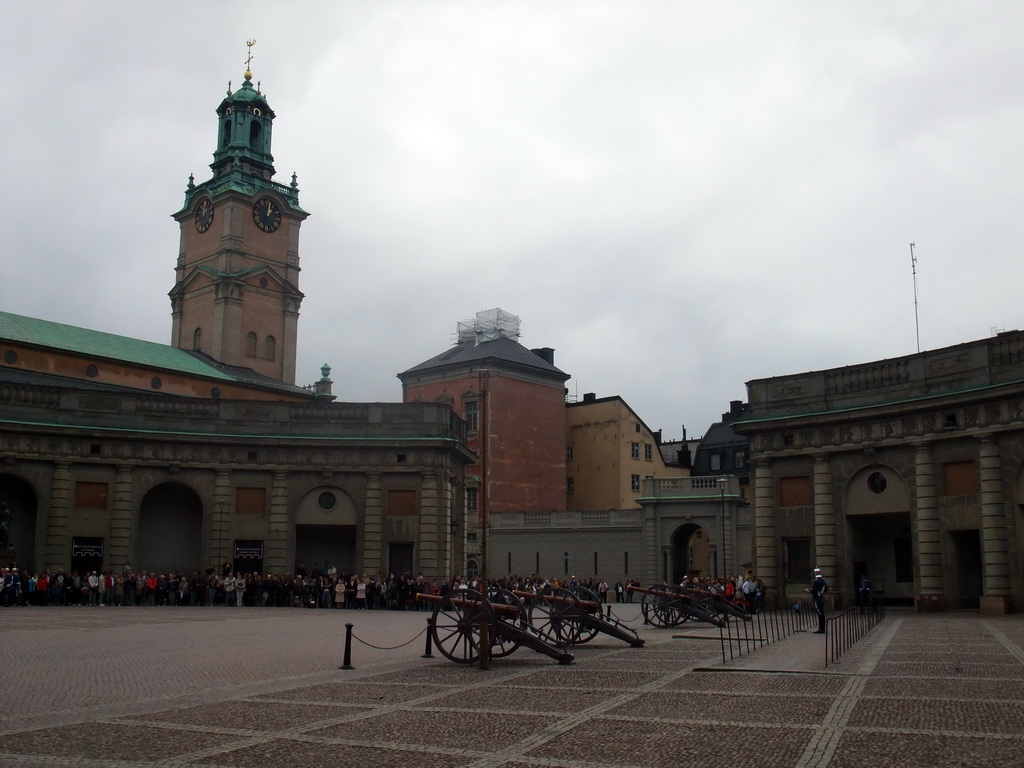 Changing of the guards, at the Outer Court of the Stockholm Palace, and the tower of the Saint Nicolaus Church