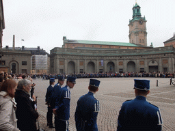 Changing of the guards, at the Outer Court of the Stockholm Palace, and the tower of the Saint Nicolaus Church