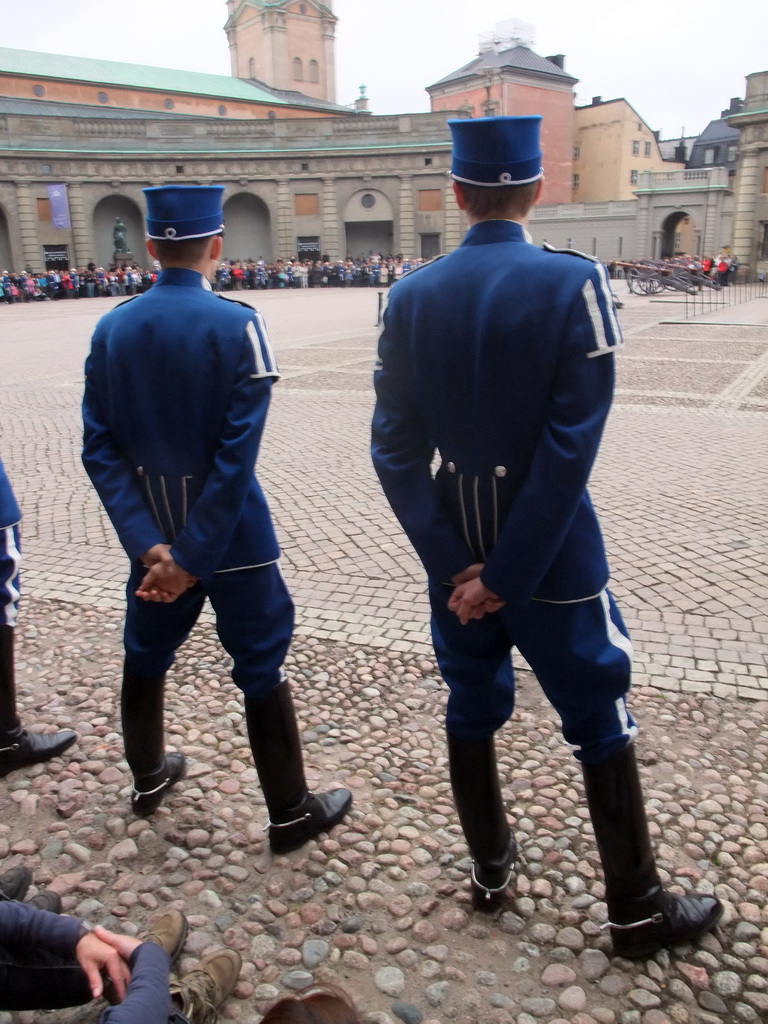 Changing of the guards, at the Outer Court of the Stockholm Palace, and the tower of the Saint Nicolaus Church