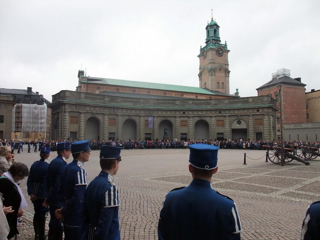 Changing of the guards, at the Outer Court of the Stockholm Palace, and the tower of the Saint Nicolaus Church