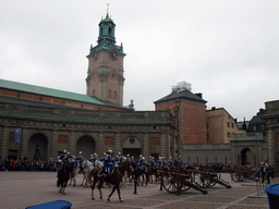 Changing of the guards, at the Outer Court of the Stockholm Palace, and the tower of the Saint Nicolaus Church