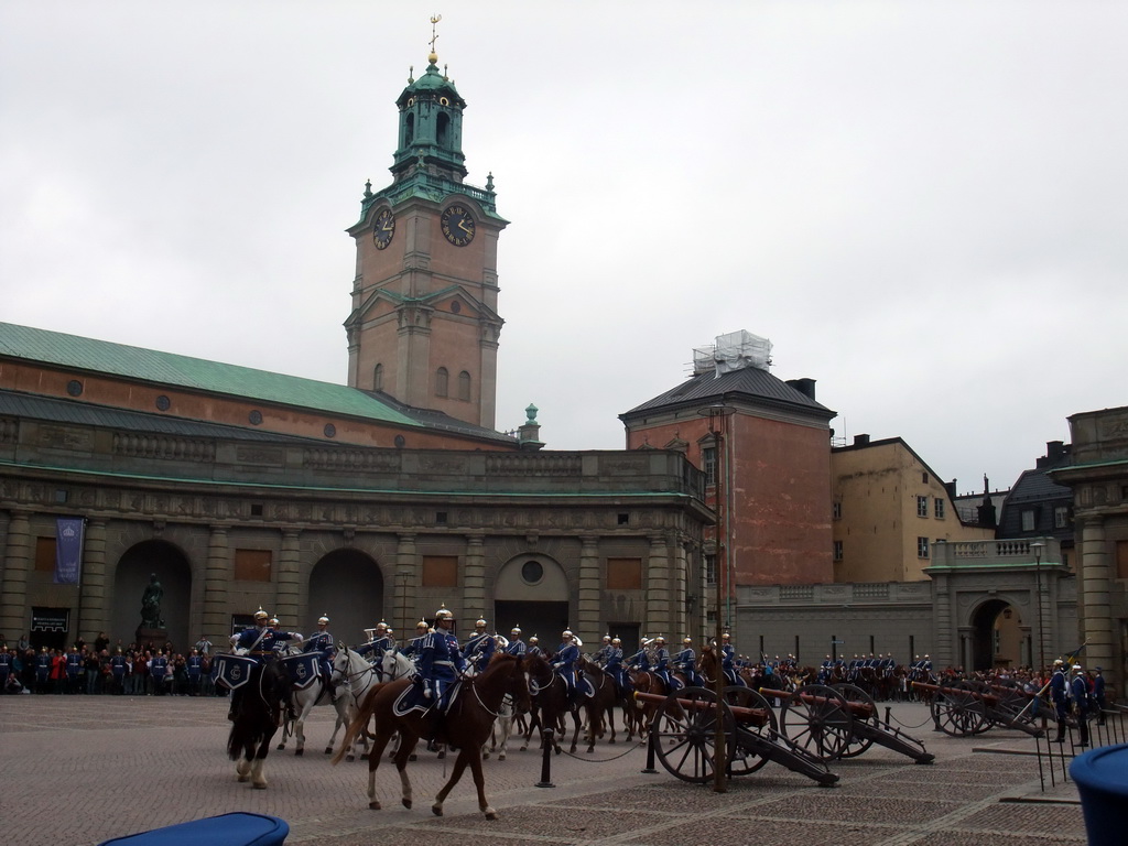 Changing of the guards, at the Outer Court of the Stockholm Palace, and the tower of the Saint Nicolaus Church