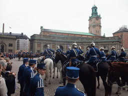 Changing of the guards, at the Outer Court of the Stockholm Palace, and the tower of the Saint Nicolaus Church