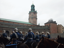 Changing of the guards, at the Outer Court of the Stockholm Palace, and the tower of the Saint Nicolaus Church