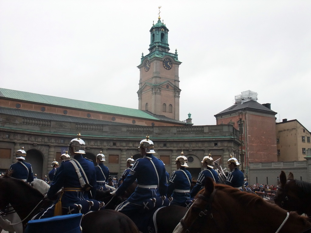 Changing of the guards, at the Outer Court of the Stockholm Palace, and the tower of the Saint Nicolaus Church