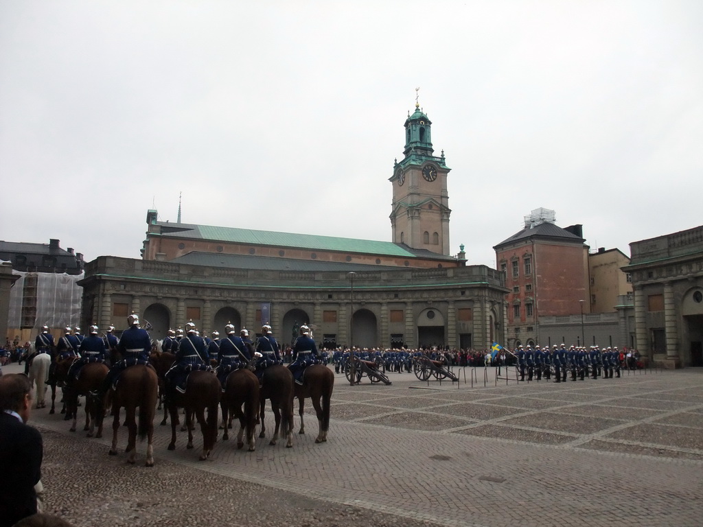 Changing of the guards, at the Outer Court of the Stockholm Palace, and the tower of the Saint Nicolaus Church