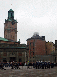 Changing of the guards, at the Outer Court of the Stockholm Palace, and the tower of the Saint Nicolaus Church