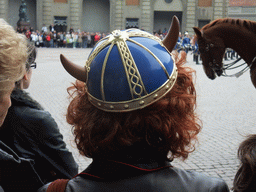 Woman with Viking helmet at the Changing of the guards, at the Outer Court of the Stockholm Palace