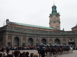 Changing of the guards, at the Outer Court of the Stockholm Palace, and the tower of the Saint Nicolaus Church