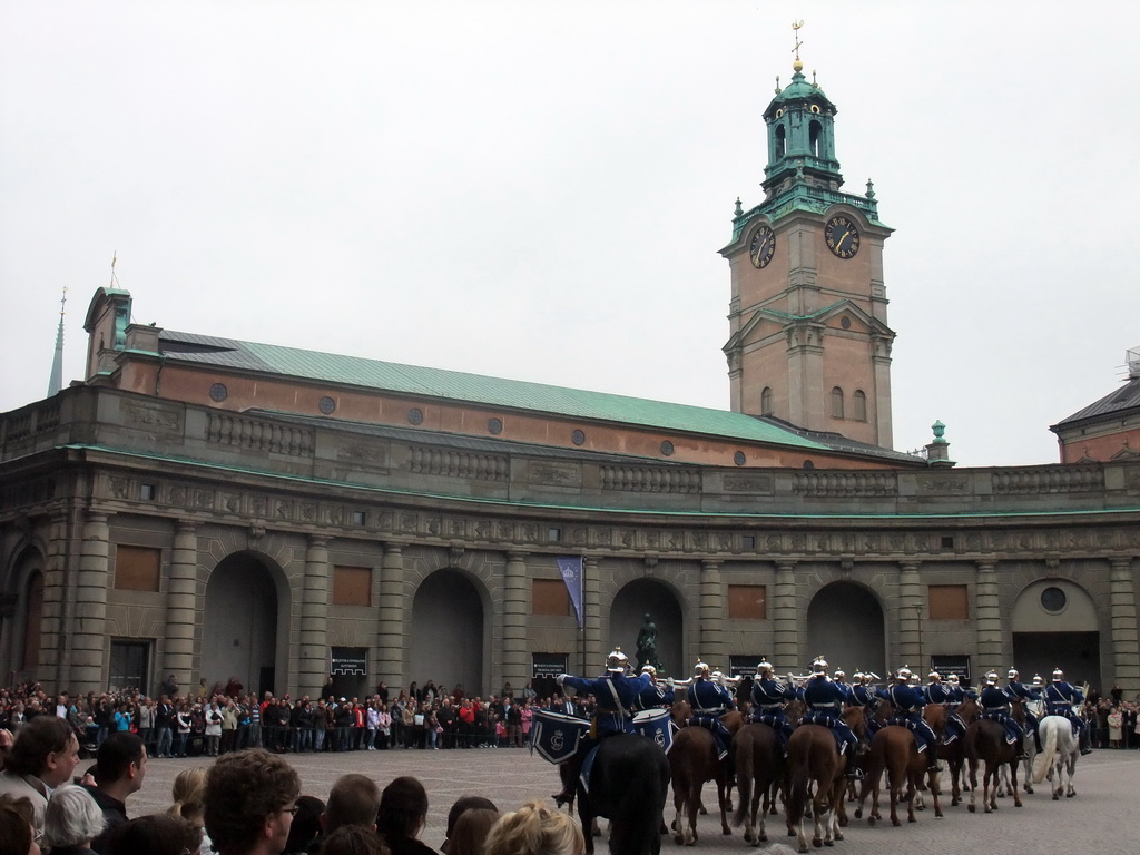 Changing of the guards, at the Outer Court of the Stockholm Palace, and the tower of the Saint Nicolaus Church