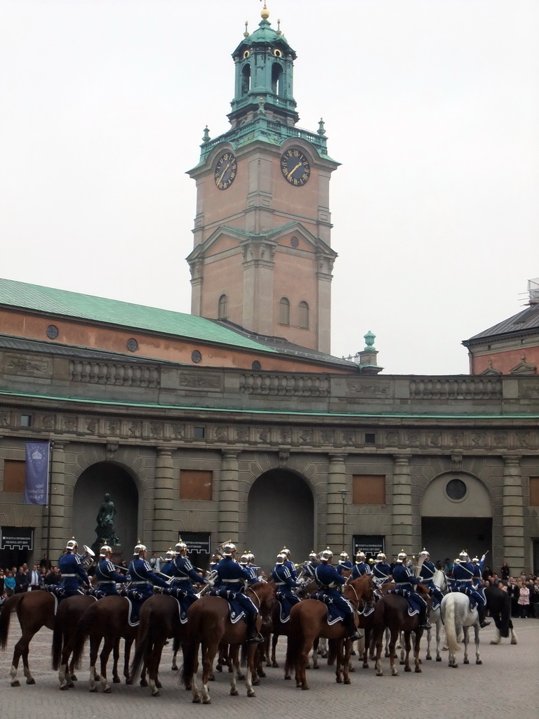 Changing of the guards, at the Outer Court of the Stockholm Palace, and the tower of the Saint Nicolaus Church