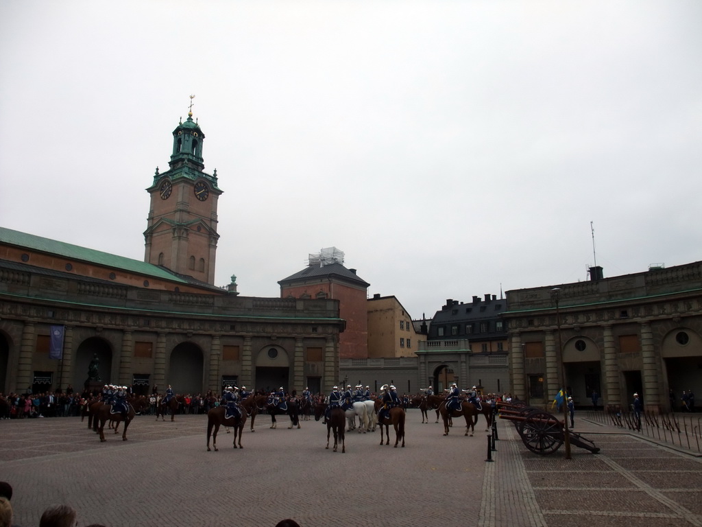 Changing of the guards, at the Outer Court of the Stockholm Palace, and the tower of the Saint Nicolaus Church