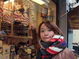 Miaomiao in front of a candy shop in the Västerlanggatan shopping street