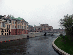 The Norrbro bridge over the Norrström river, the Royal Swedish Opera (Kungliga Operan) and the tower of the Saint James`s Church (Sankt Jacobs kyrka), viewed from the Riksbron bridge