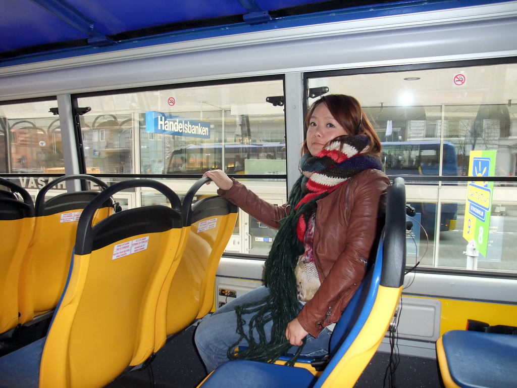 Miaomiao inside a sightseeing bus