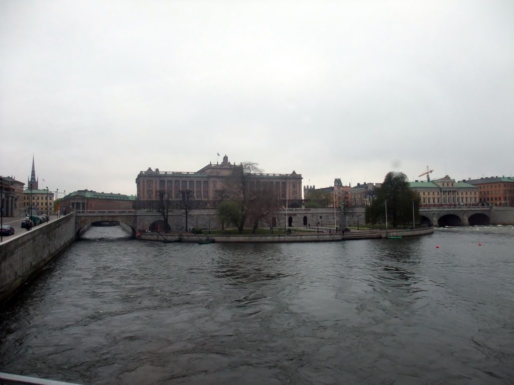 The Norrström river and the Riksdag building, from the sightseeing bus on the Strömbron bridge