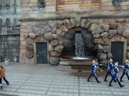 Royal guards at a fountain on the northeast side of Stockholm Palace, from the sightseeing bus