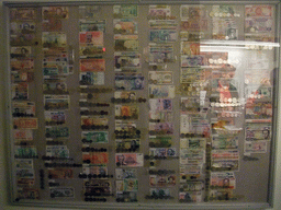 Overview of coins and banknotes, in front of the elevator to the main tower of the Stockholm City Hall