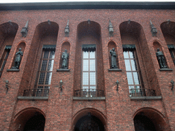 Wall with statues at the Borgargarden courtyard of the Stockholm City Hall