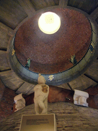 Statues in the Tower Museum and dome of the main tower of the Stockholm City Hall