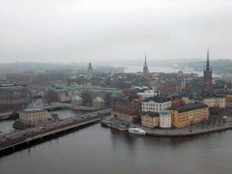 View on the Gamla Stan neighborhood with the Riddarholmen Church, the Swedish House of Nobility, the Riksdag building, the Strömsborg castle, the Stockholm Palace, the Saint Nicolaus Church and the German Church, from the top of the main tower of the Stockholm City Hall