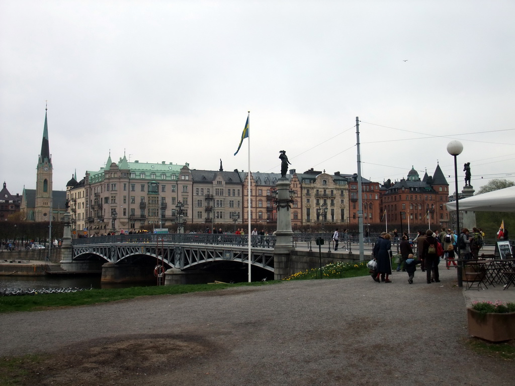 The Djurgardsbron bridge over the Saltsjön bay, buildings in the Strandvägen street and Oscar`s Church (Oscarskyrkan)