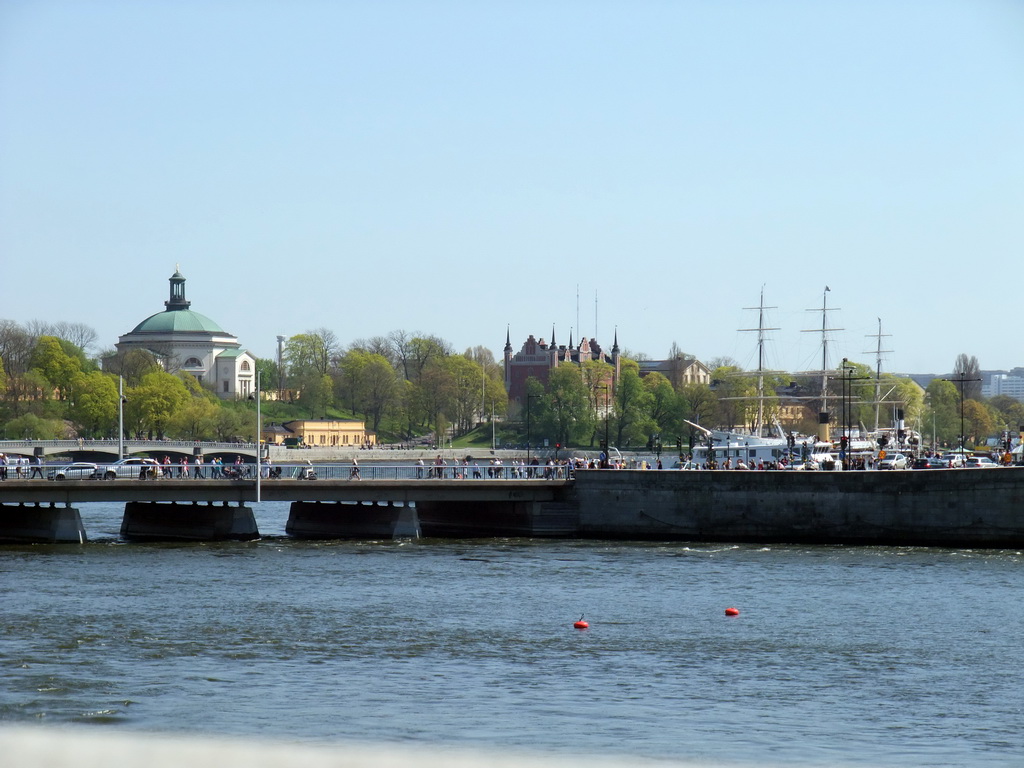 The Strömbron bridge and the Skeppsholmsbron bridge over the Norrström river, the Skeppsholm Church (Skeppsholmskyrkan) and the Admiralty House (Amiralitetshuset)