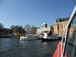 Boats in the Nybroviken bay, the Nybroplan square and the Royal Dramatic Theatre, viewed from the Saltsjön ferry